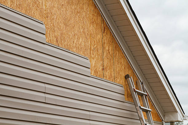 Professional Vinyl Siding technician working in Entriken, PA